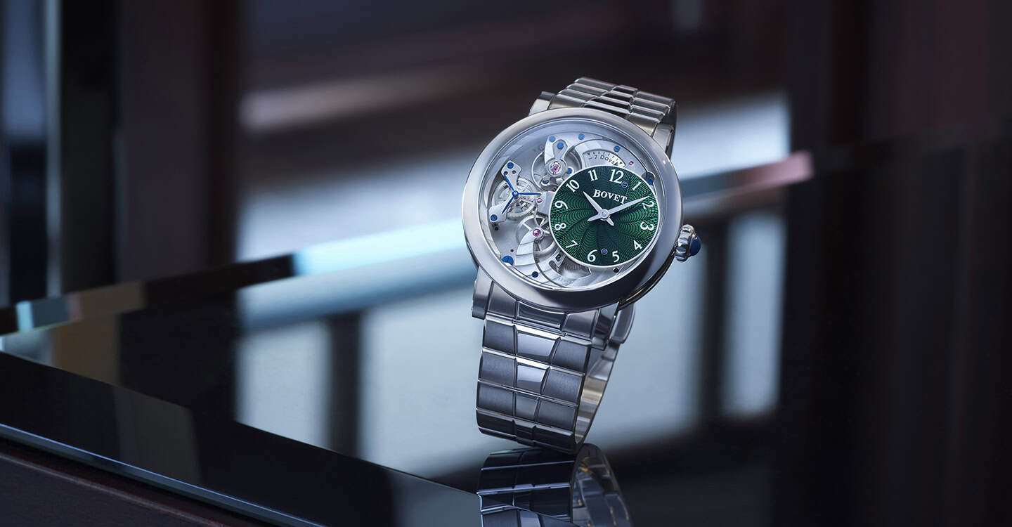 Elegant Bovet timepiece with intricate skeleton dial and stainless steel bracelet.