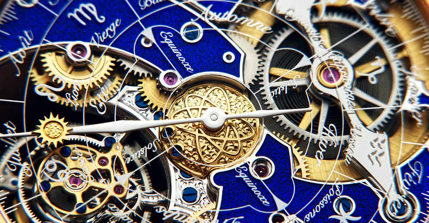 Intricate mechanical movement of a luxury timepiece with gold and blue accents.