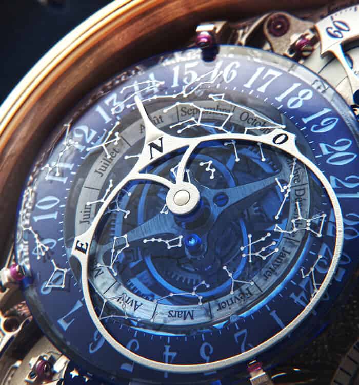 An elegant blue and silver timepiece with intricate celestial and calendar complications, showcasing.