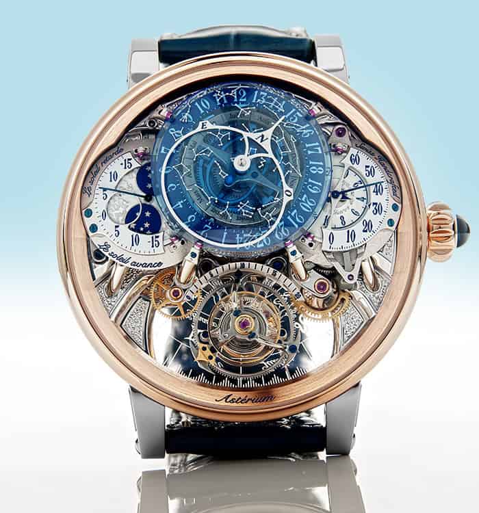 Exquisite Dimier Récital 20 timepiece with intricate skeleton design and blue accents.