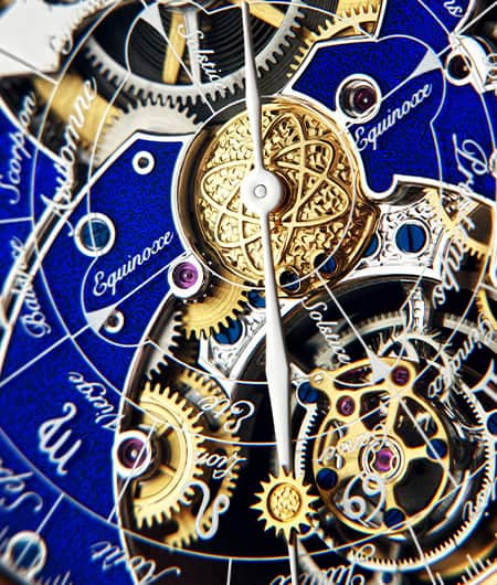 A stunning close-up of the intricate mechanical movement of a Dimier Récital 20 timepiece, showcasin.