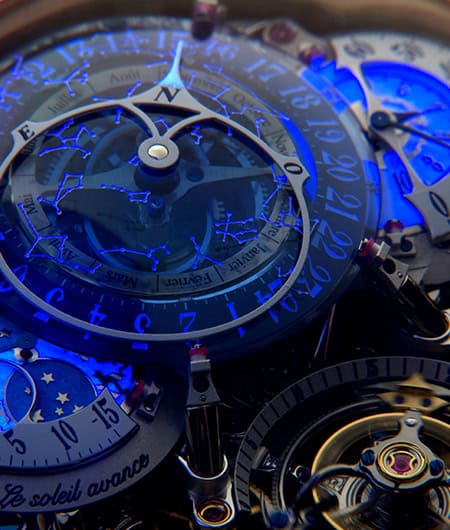 Exquisite blue dial with intricate mechanical details of a luxury timepiece.