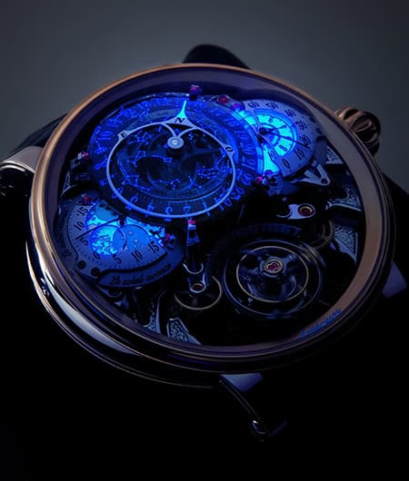 Exquisite Dimier timepiece with intricate skeleton dial and blue accents, showcasing fine craftsmans.