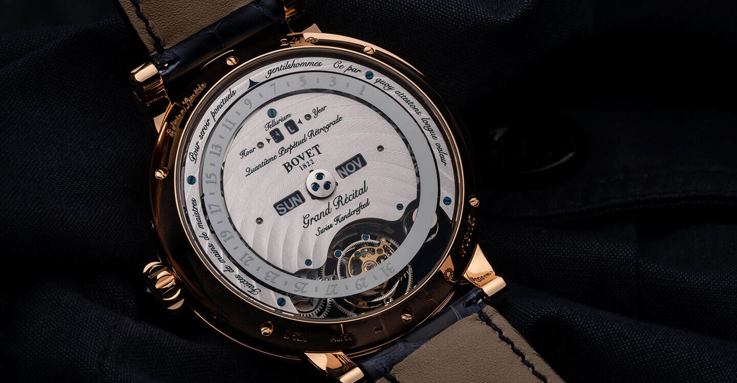 Elegant Bovet timepiece with intricate dial design and moon phase display, from Dimier - Récital 22.