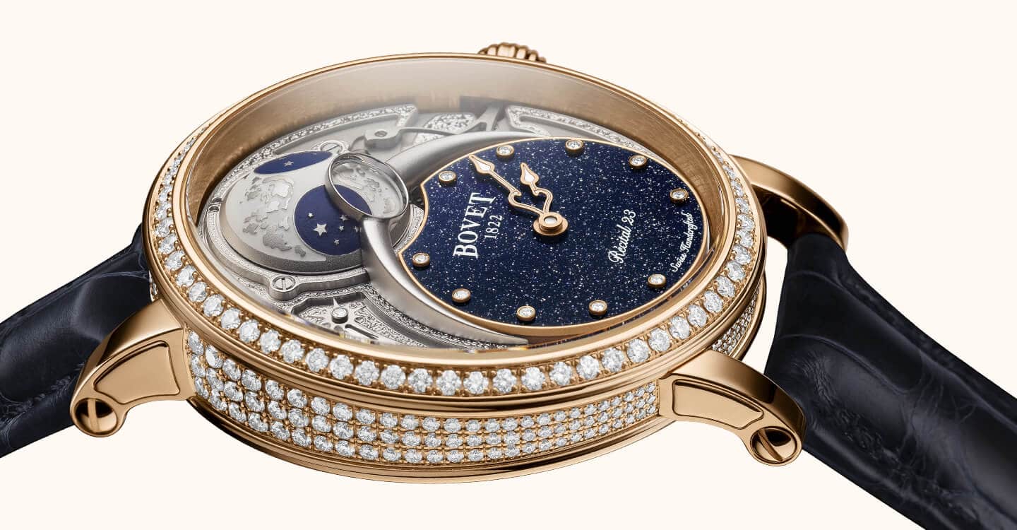 Luxurious Bovet timepiece with diamond-set bezel and celestial dial design.