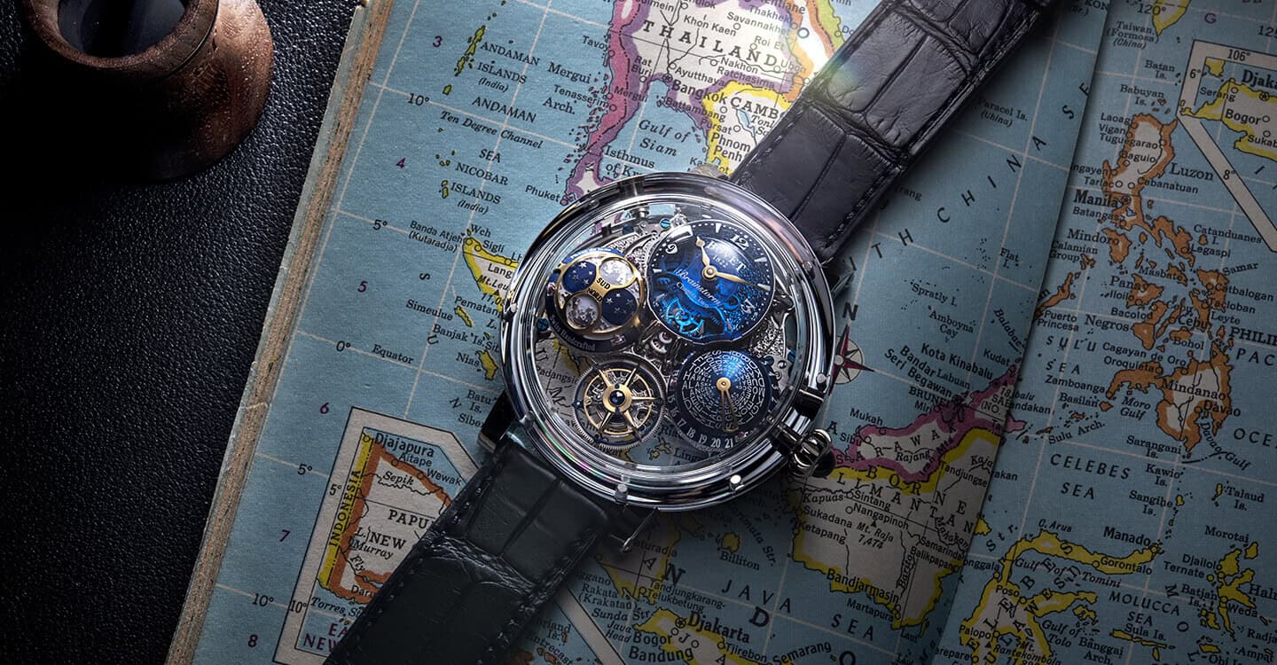Exquisite Dimier timepiece with intricate mechanical details and a black leather strap.