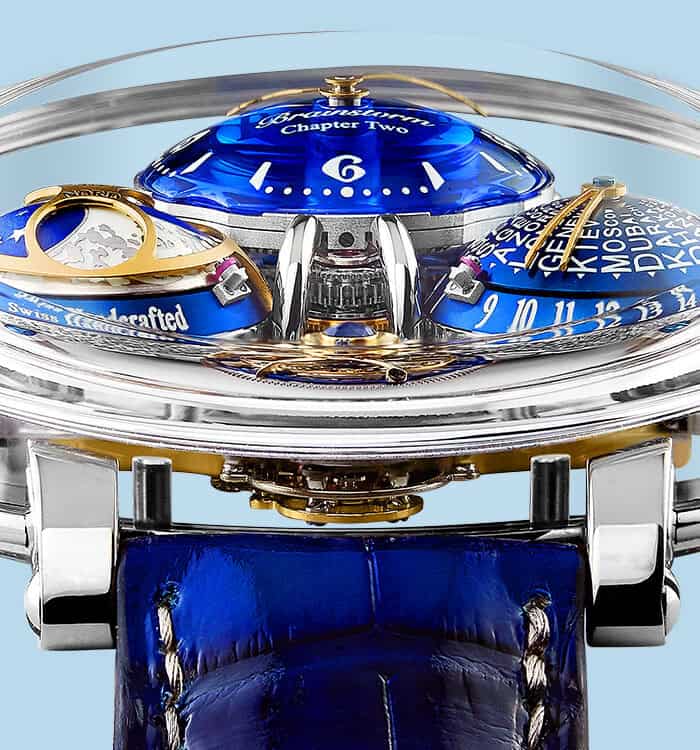 A stunning blue and gold timepiece with intricate details and multiple dials, showcasing luxury craf.
