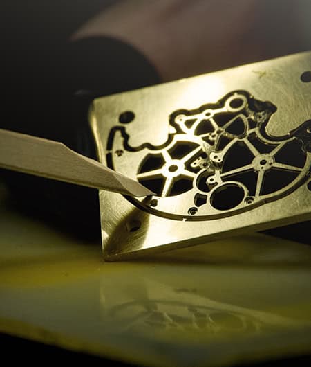 A detailed close-up of a mechanical timepiece movement showcasing intricate gears and components.
