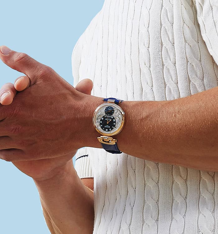 Elegant Fleurier 19Thirty timepiece with dual dials and leather strap on wrist.