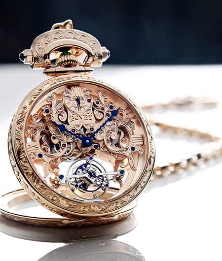 Luxurious Amadéo Tourbillon timepiece with intricate gold detailing and open-work design.