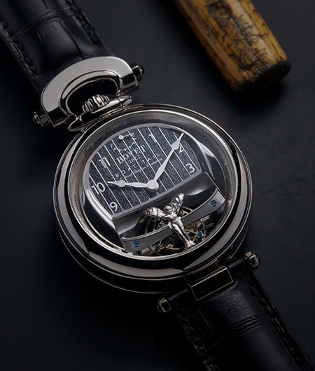 Luxurious Bovet timepiece with intricate design and elegant black leather strap.