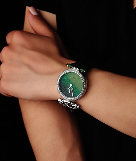 Elegant Fleurier timepiece with a green dial and diamond accents on the bezel.