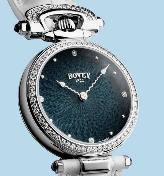 Elegant Bovet Miss Audrey timepiece with diamond accents and deep blue dial.