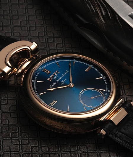 Luxurious Bovet timepiece with blue dial and gold case, inspired by Fleurier craftsmanship.