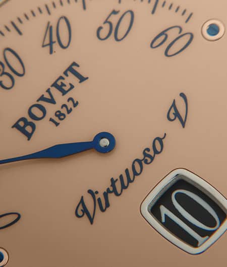 Elegant Fleurier Virtuoso V timepiece dial with blue hands and date display.