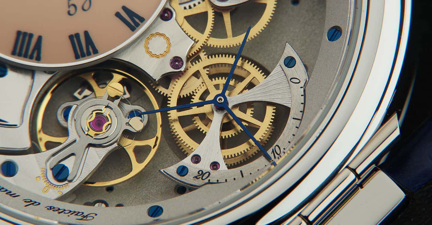 A detailed close-up of the Fleurier Virtuoso V timepiece showcasing intricate mechanical gears and c.