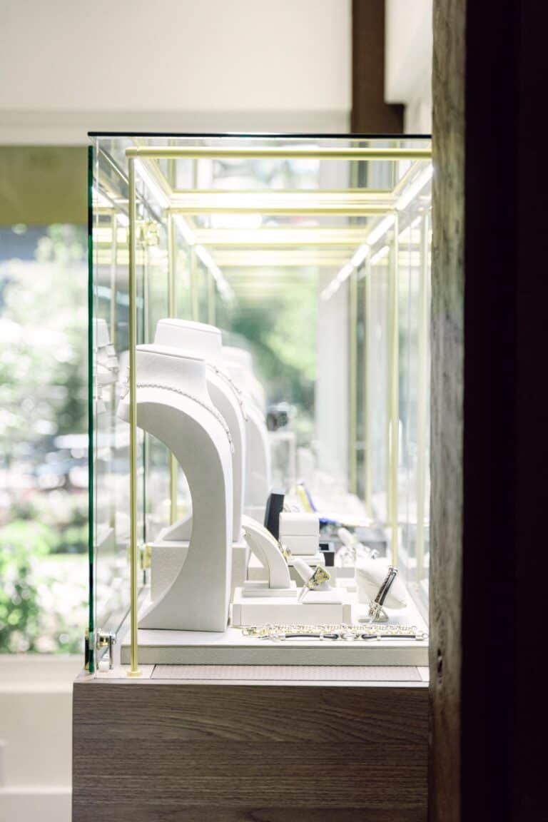 A stunning display of luxury timepieces showcased in a glass case at Naifeh Fine Jewelry Idaho.