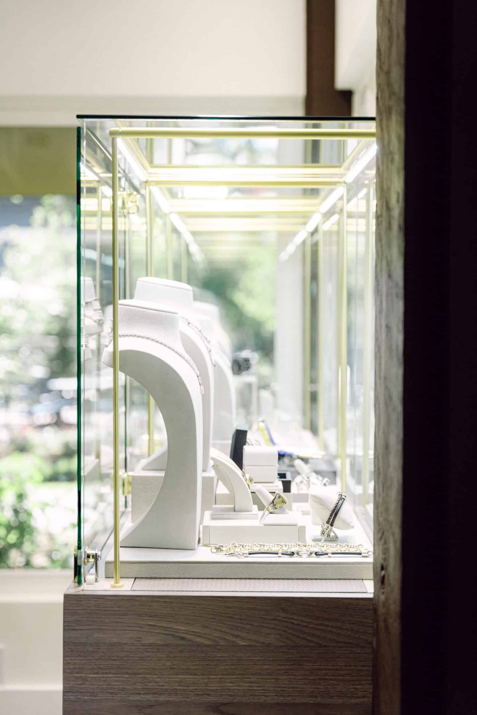 Elegant timepiece display case showcasing luxury jewelry and timepieces at Naifeh Fine Jewelry Idaho.