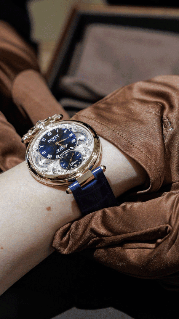 Luxurious Bovet timepiece with intricate dial and elegant strap on a wrist.