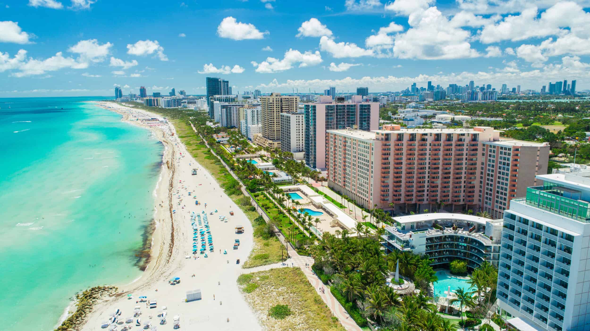 Elegant cityscape with beachfront and high-rise buildings, showcasing luxury lifestyle and modern ar.