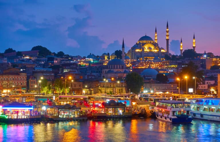 Elegant Istanbul skyline featuring the Blue Mosque illuminated at dusk, highlighting the intricate a.