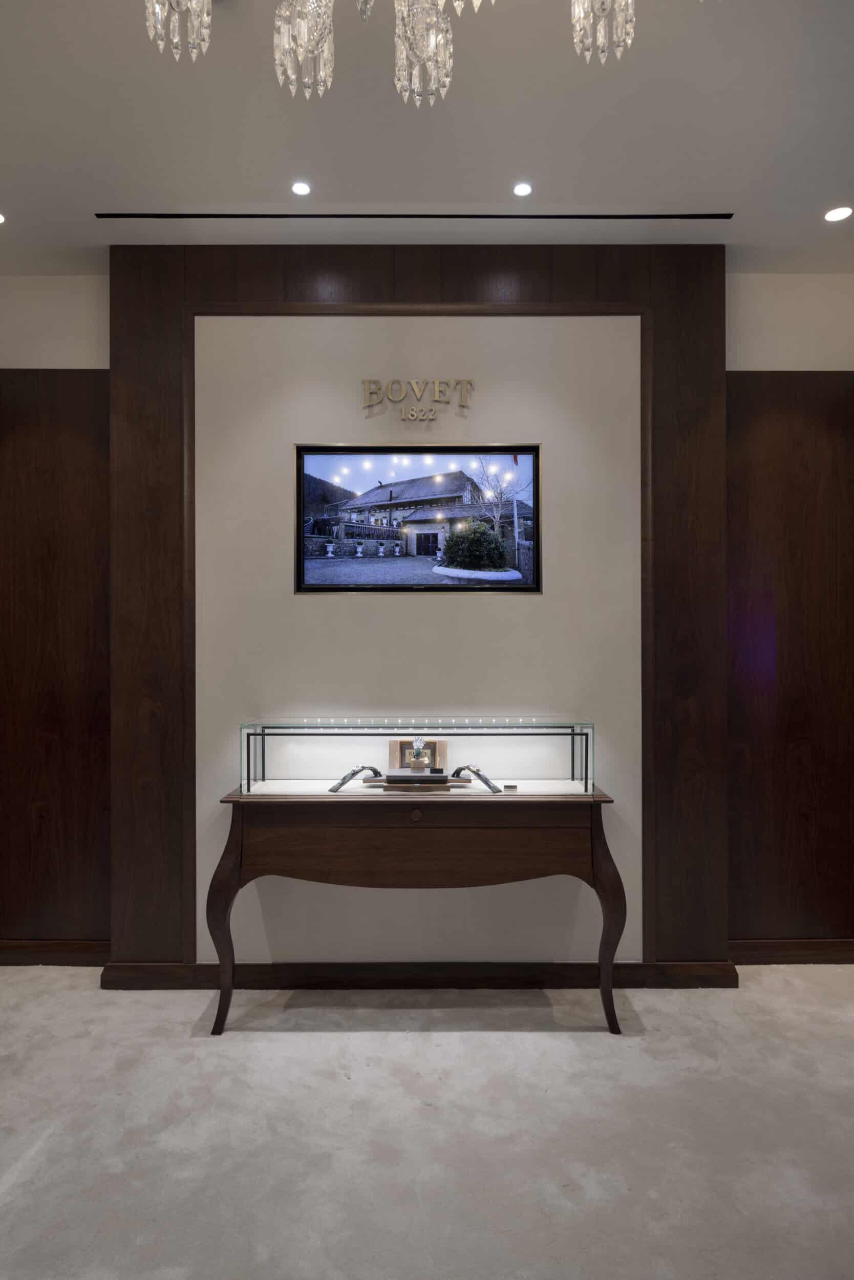 Elegant Bovet display area with a sleek timepiece showcase and modern interior design.