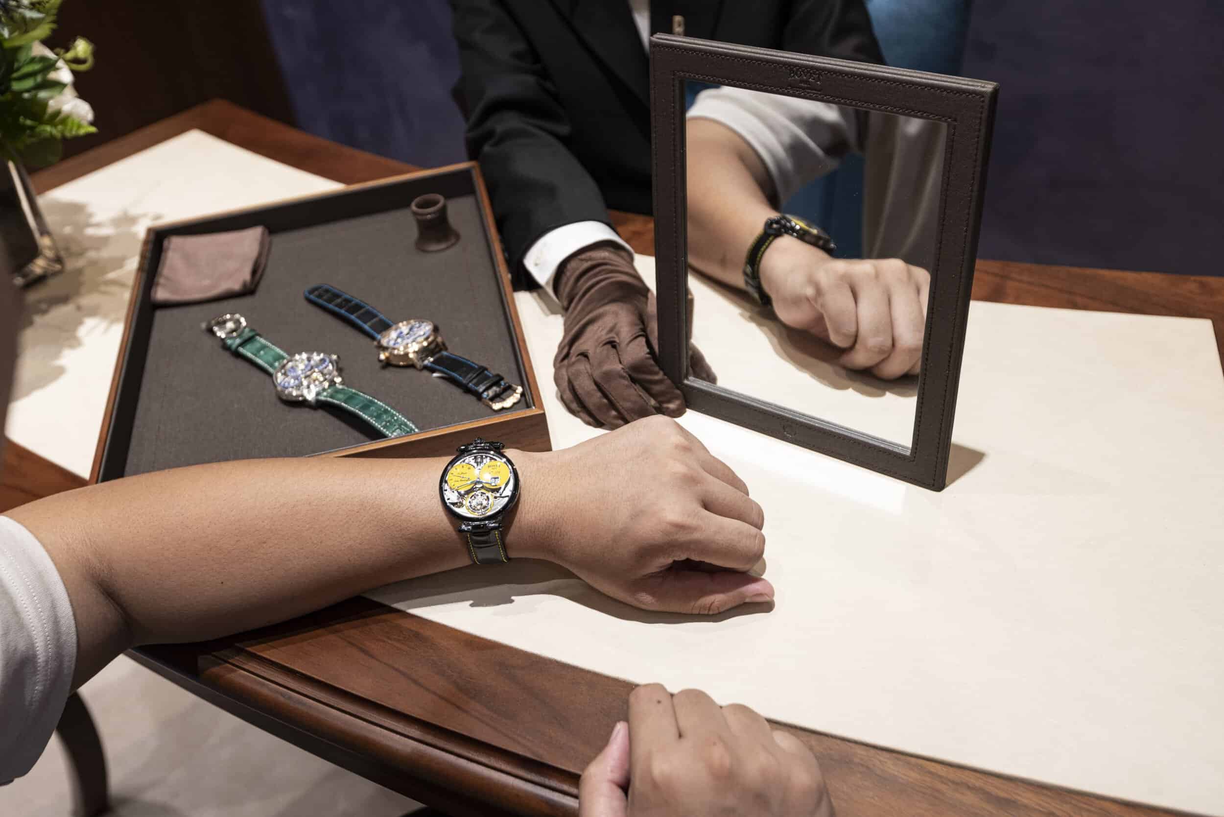 Elegant timepiece showcased with jewelry at Bovet Vietnam event.