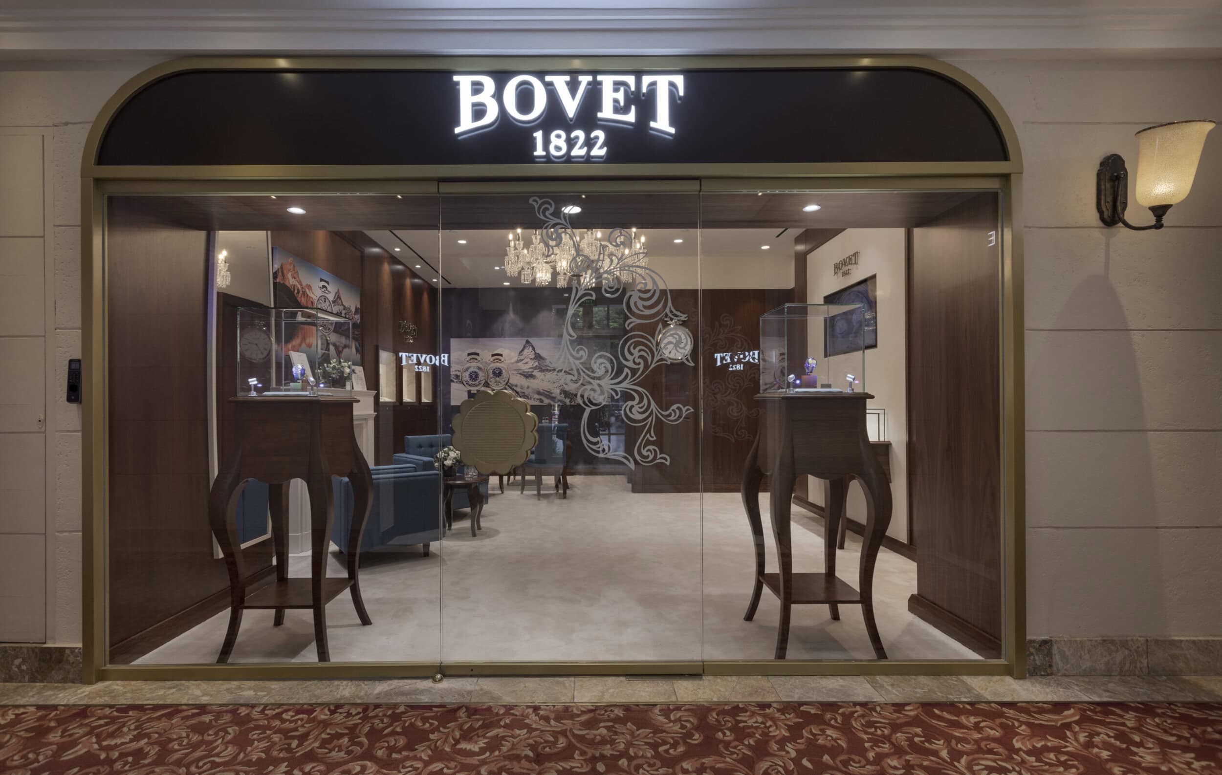 Elegant Bovet storefront showcasing luxury timepieces with a sophisticated interior design.