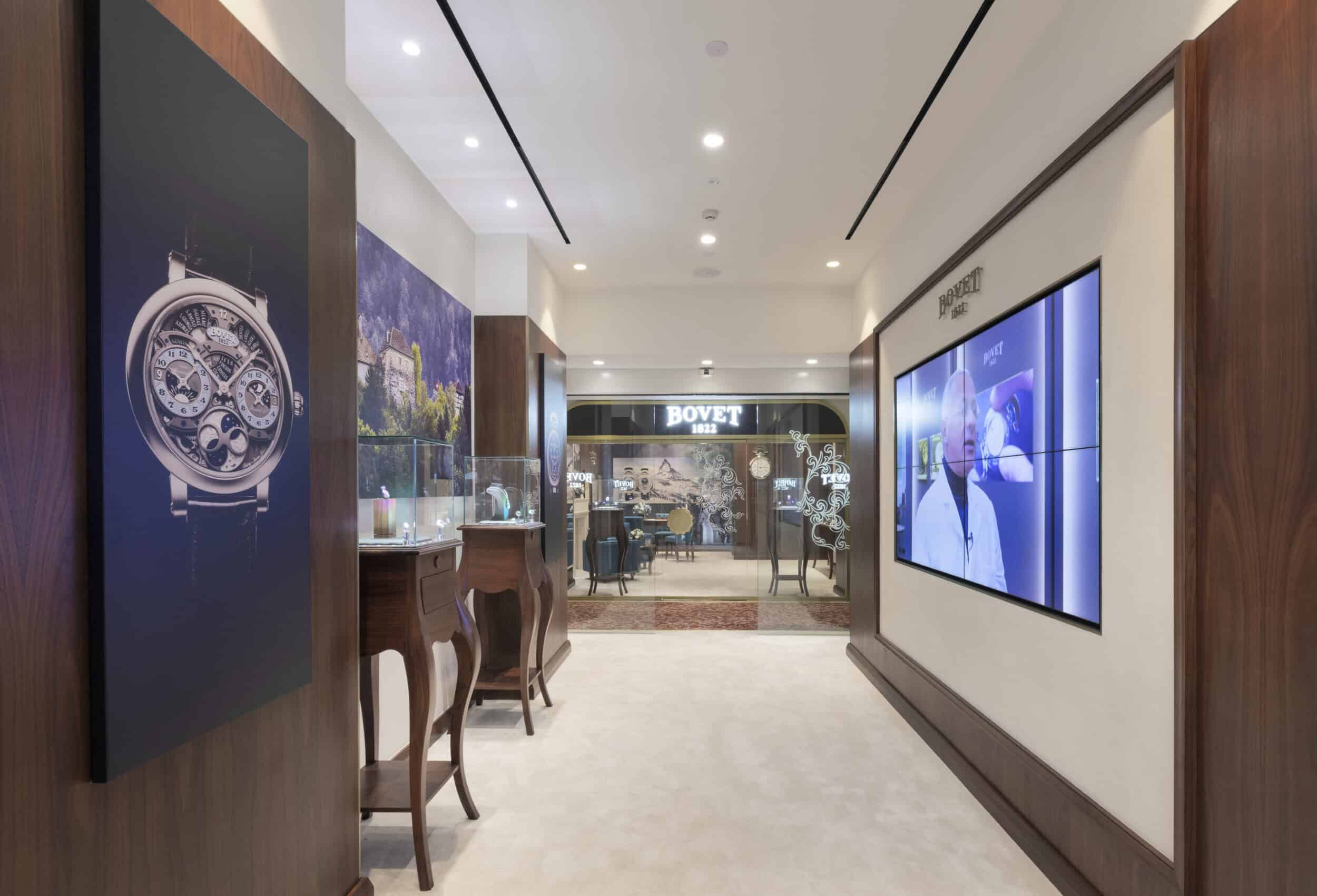 Elegant Bovet boutique interior showcasing luxury timepieces in a sophisticated setting.