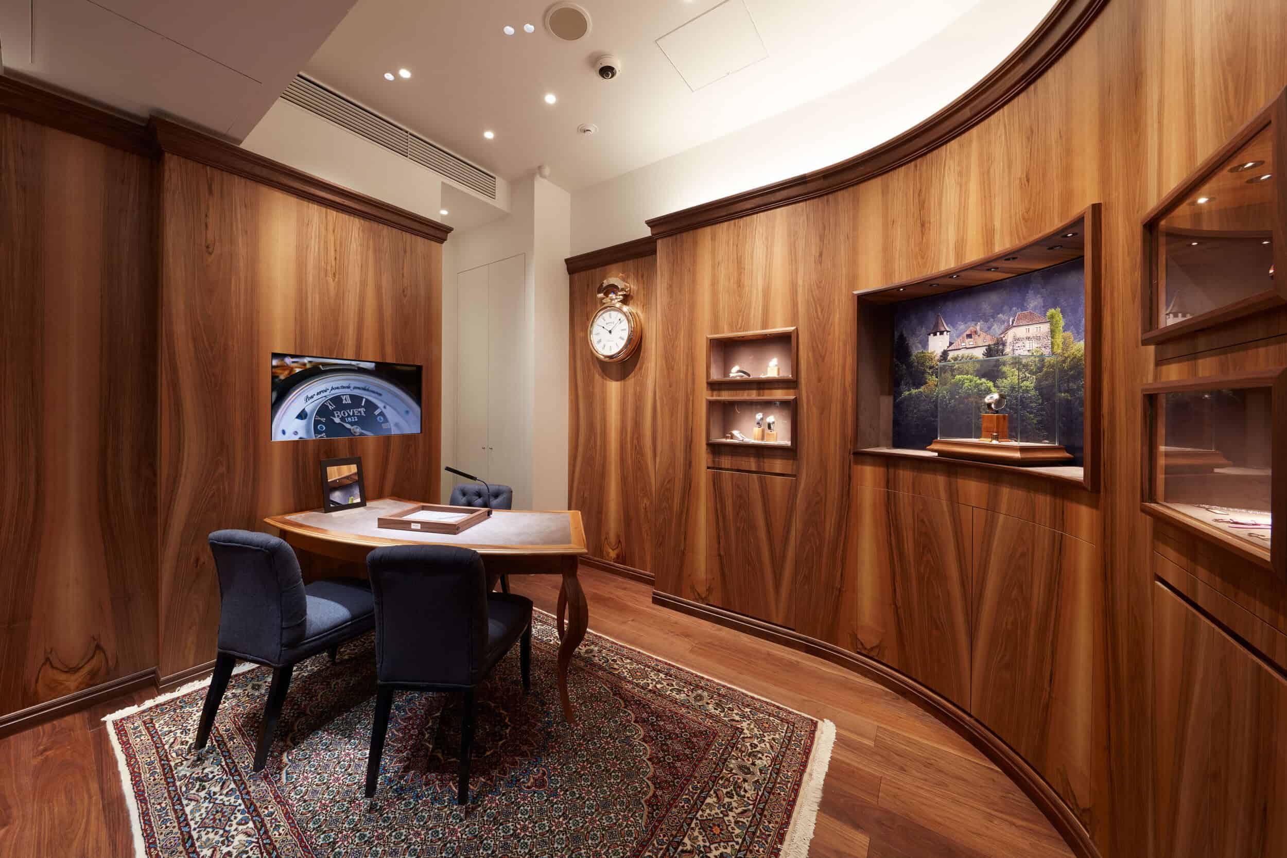 Elegant Bovet timepiece display in Tokyo with wooden interior and classic decor.