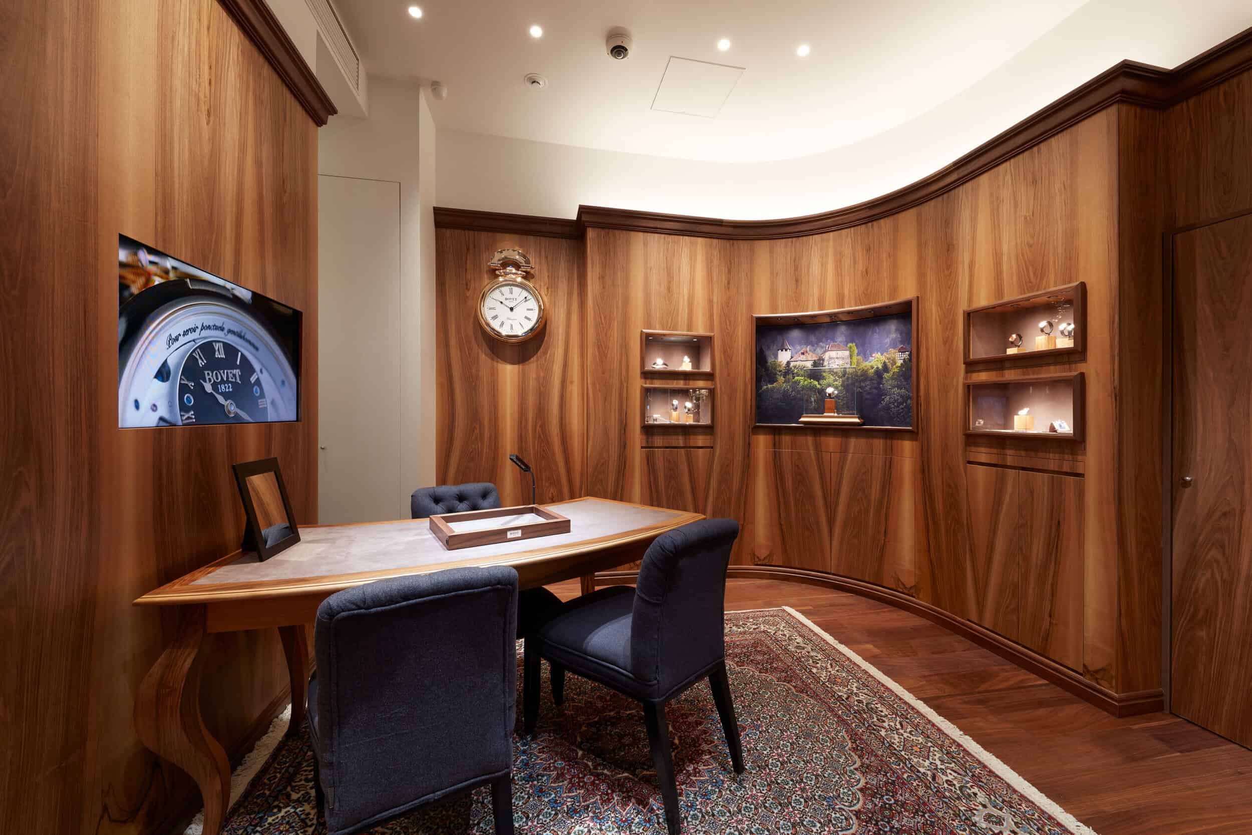Elegant interior of Bovet Tokyo showcasing luxury timepieces and sophisticated decor.