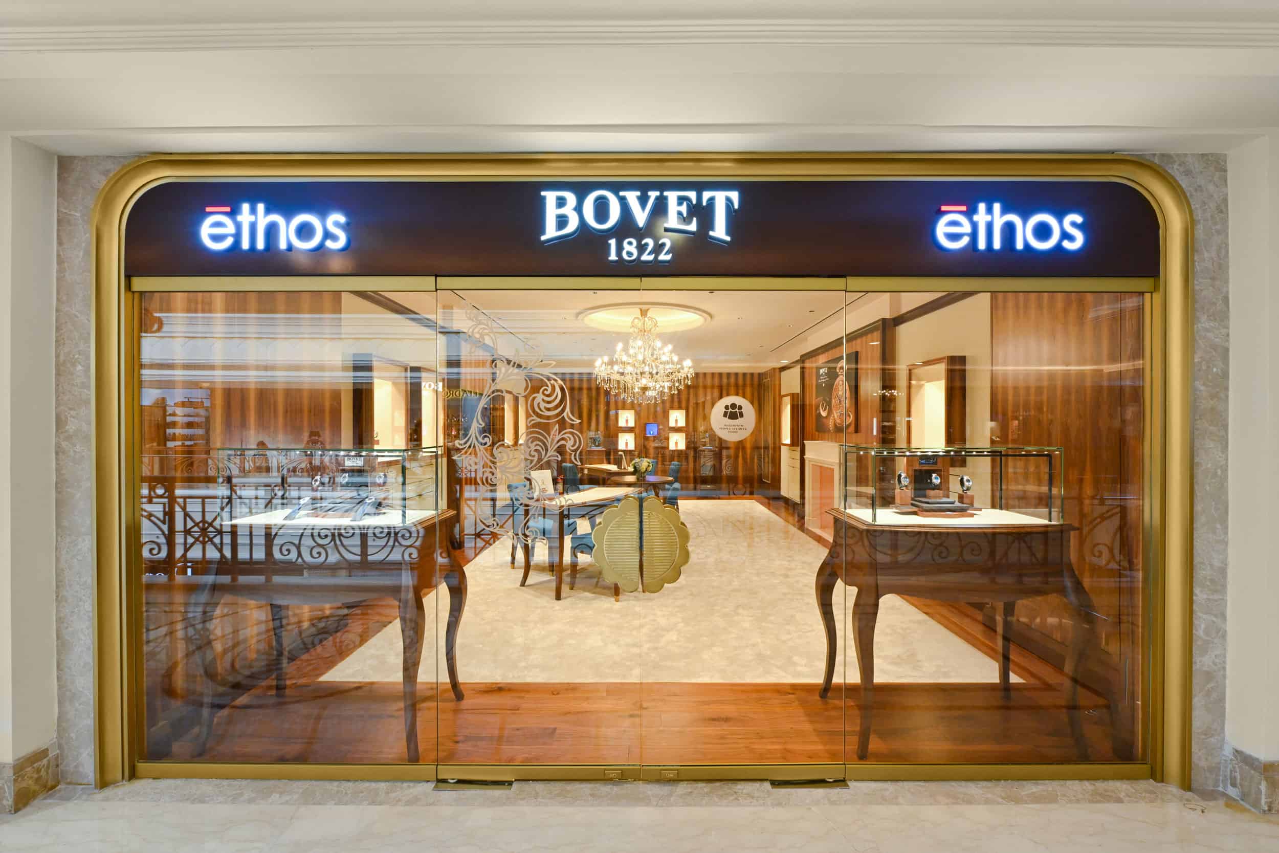 Elegant Bovet boutique storefront showcasing luxury timepieces in a sophisticated setting, located i.
