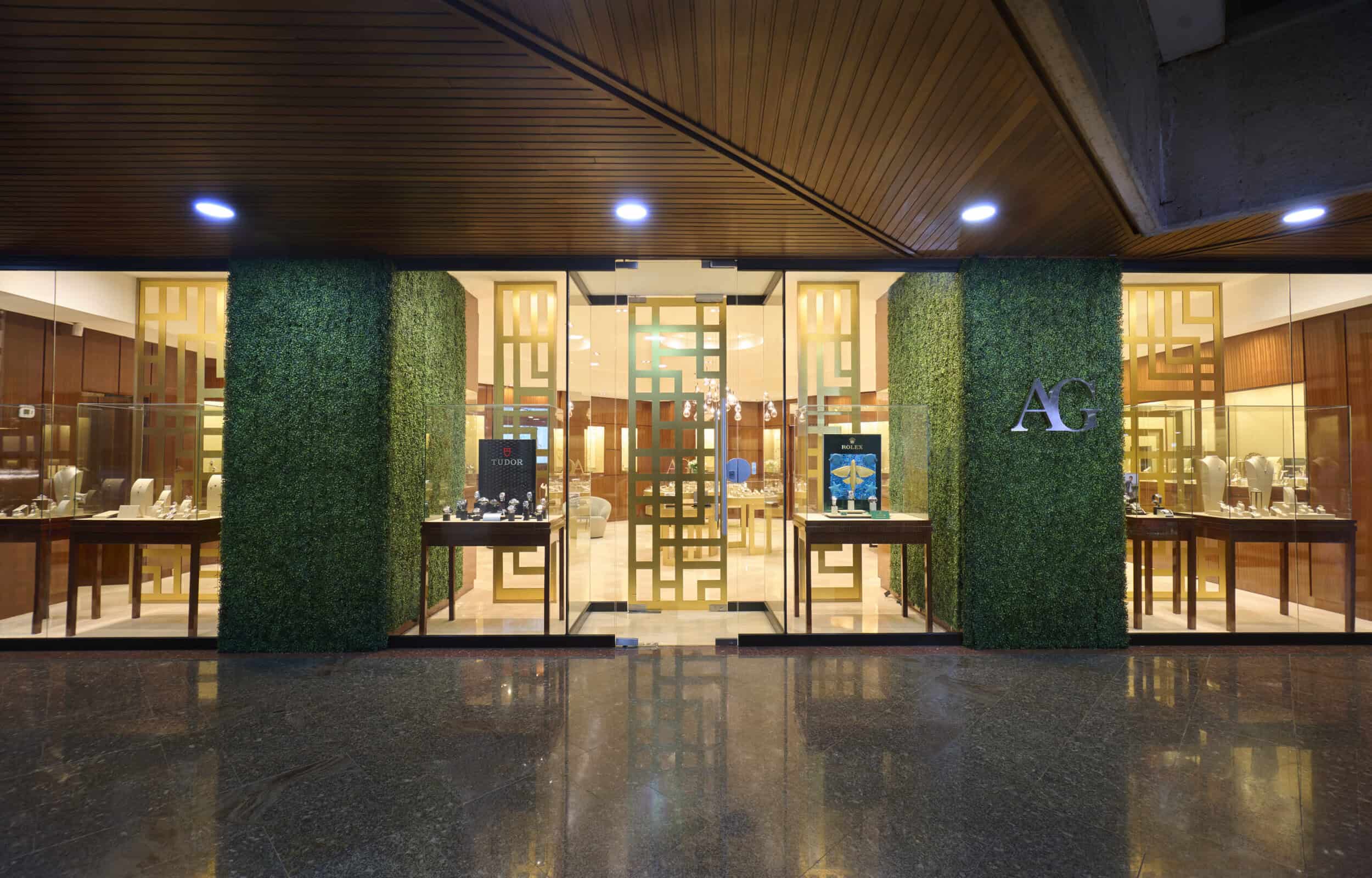 Elegant storefront of AG Joyeria showcasing luxurious timepieces and jewelry displays in a sophistic.