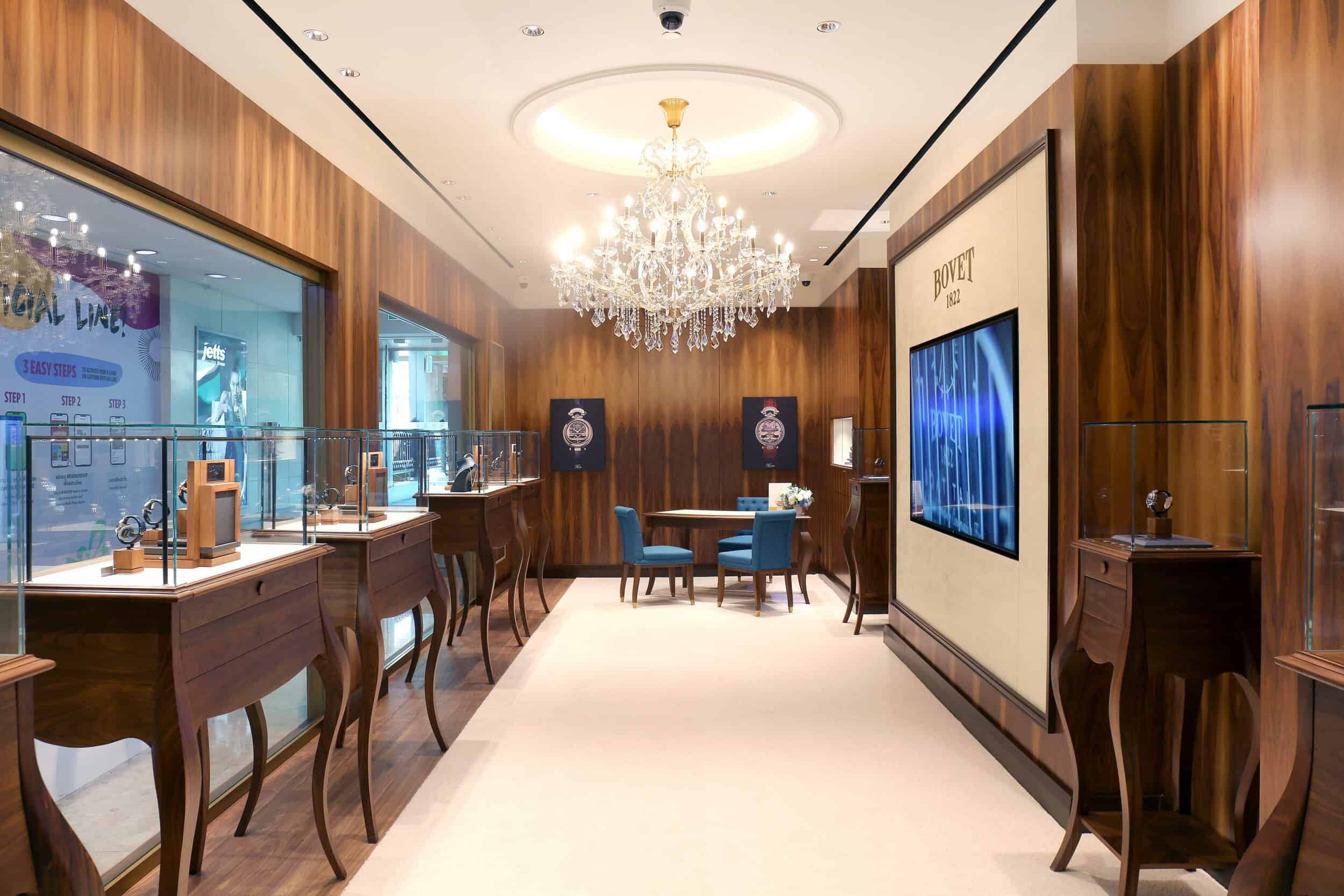 Elegant Bovet boutique interior showcasing luxurious timepieces in a sophisticated setting.