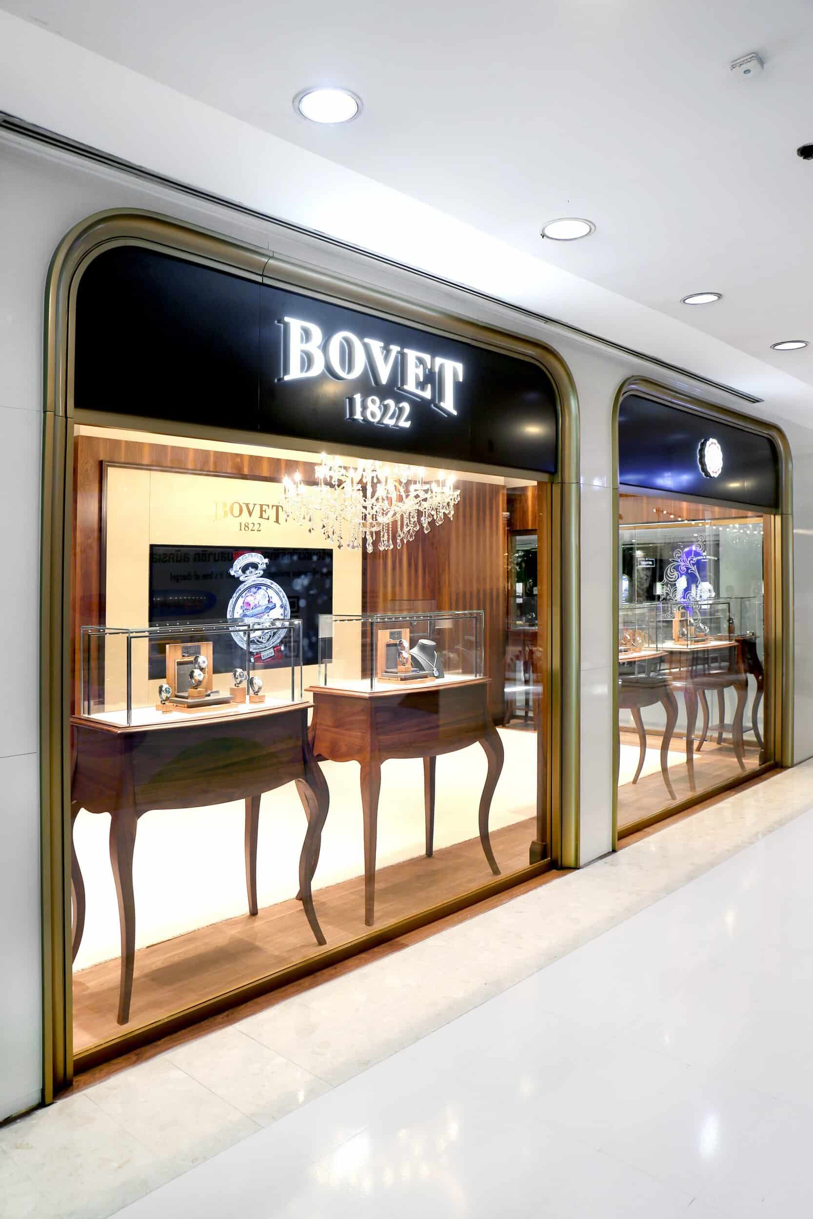 Elegant Bovet display window showcasing luxurious timepieces in a sophisticated retail setting.