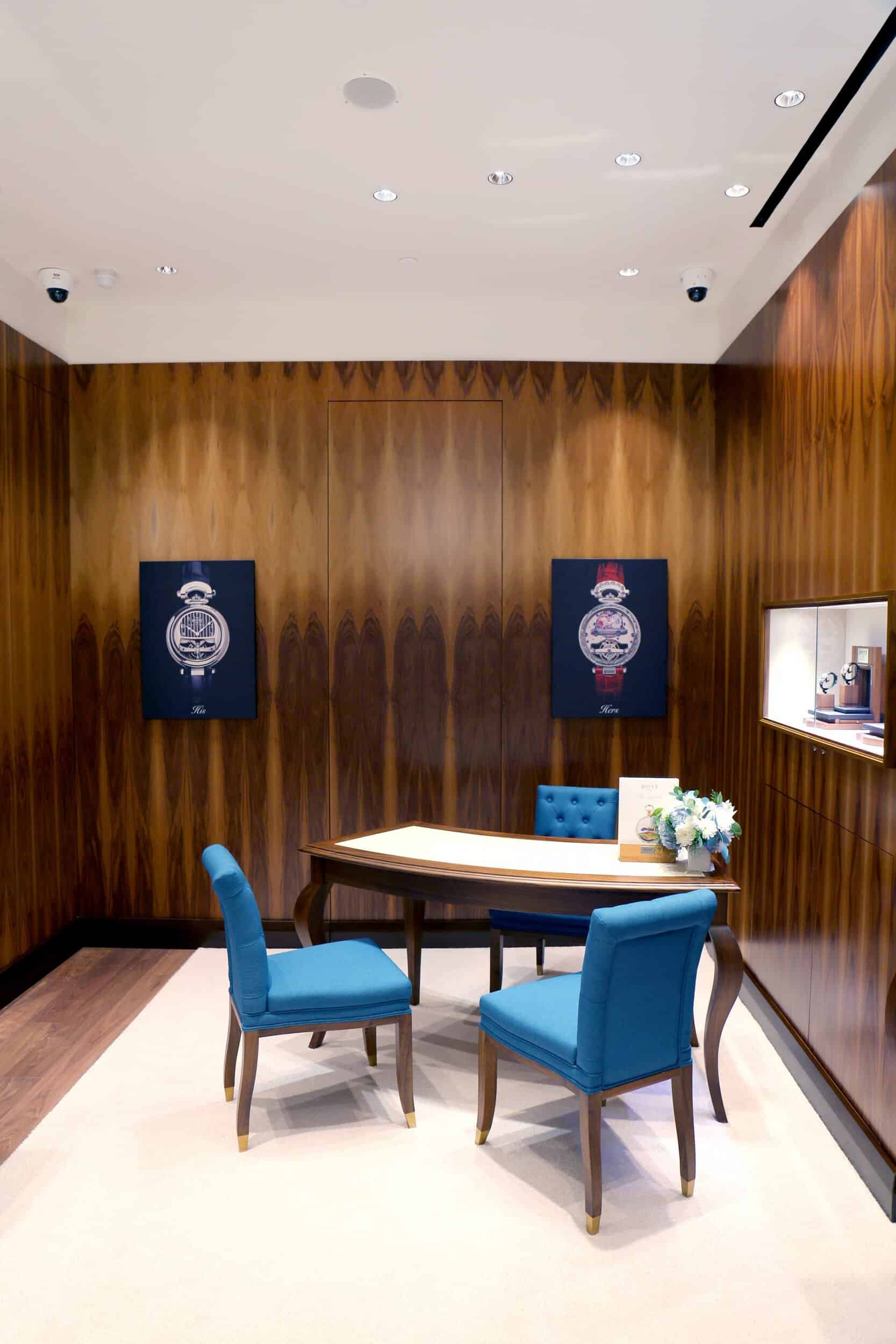 Elegant Bovet timepieces displayed in a luxurious showroom setting.