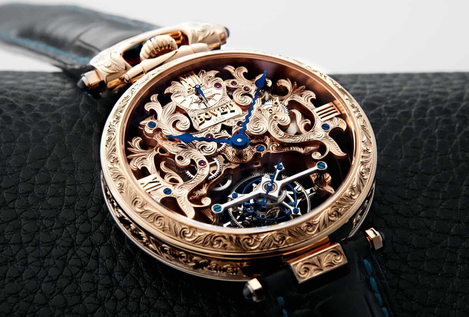 Exquisite skeletonized timepiece with intricate engravings and blue accents, showcasing craftsmanshi.