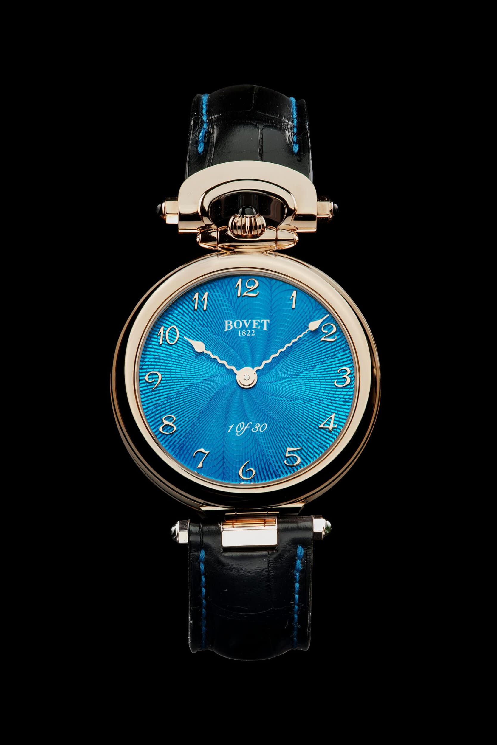 Elegant turquoise timepiece with a guilloché dial and luxurious black leather strap, showcasing Bove.
