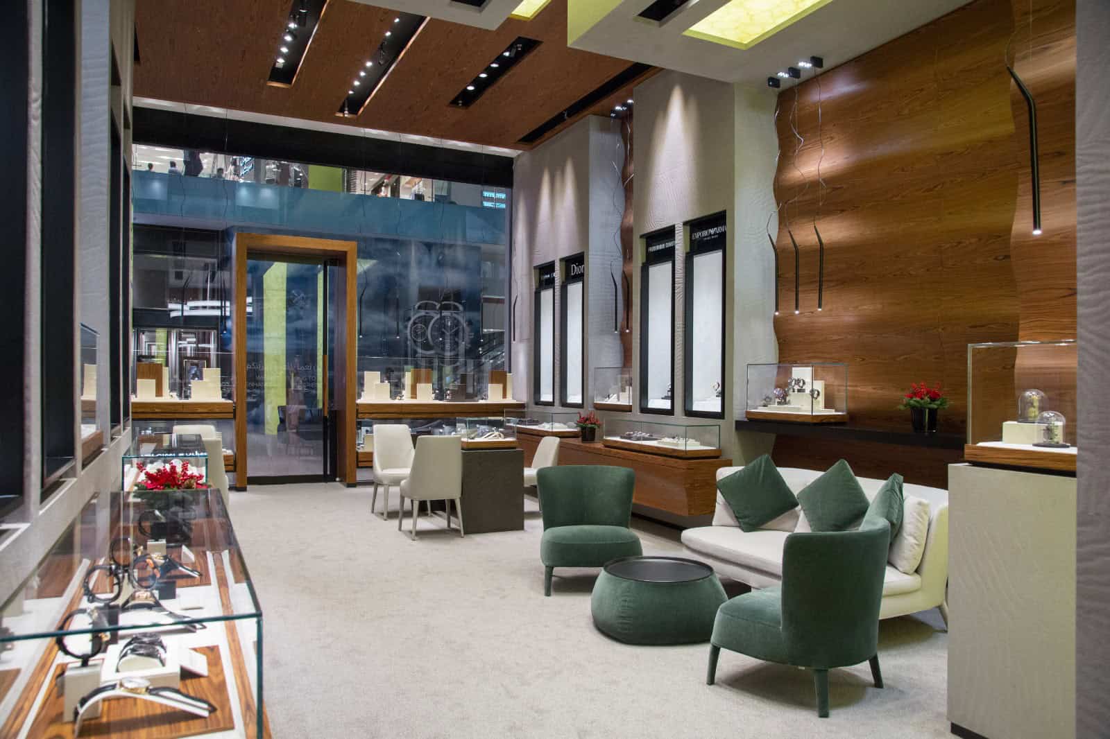 Elegant interior of Bovet boutique showcasing luxurious timepieces in a sophisticated setting.