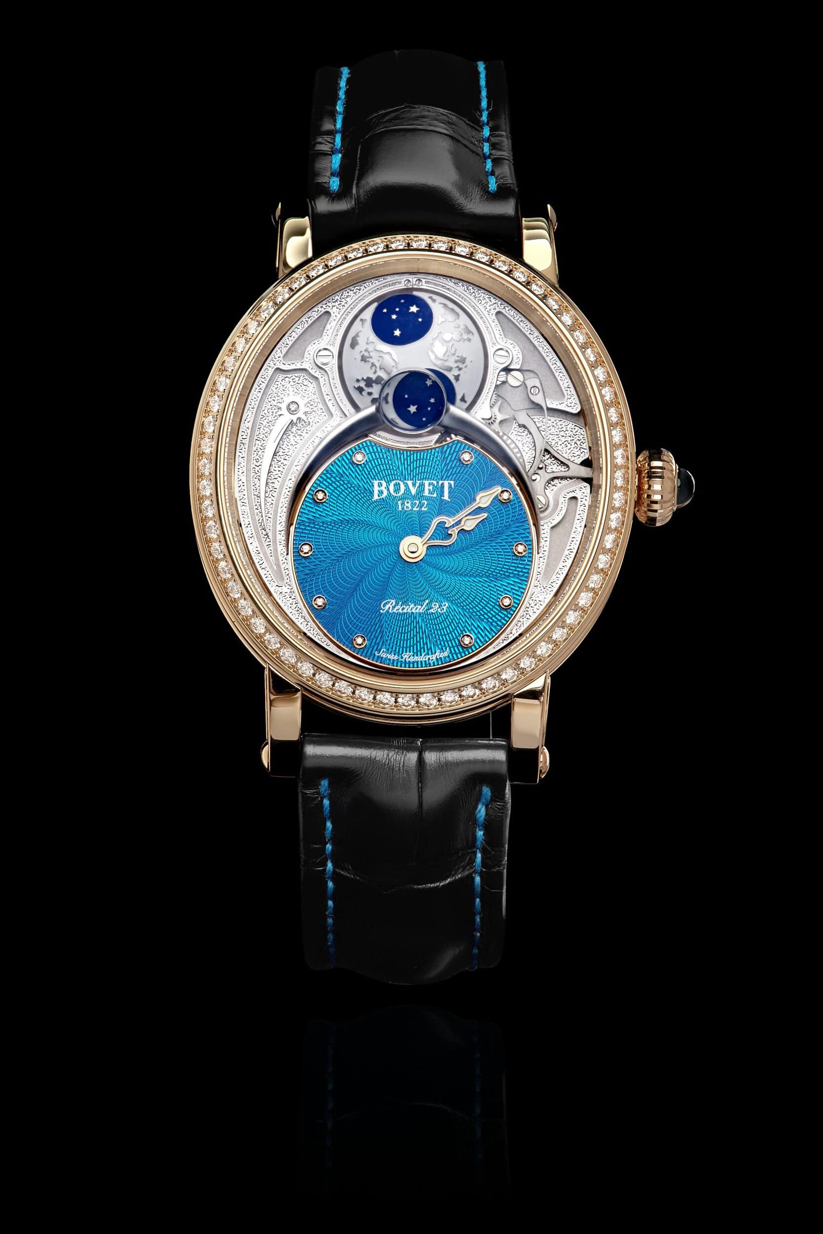 Elegant turquoise timepiece with intricate guilloché dial and celestial moon phase display, showcasi.