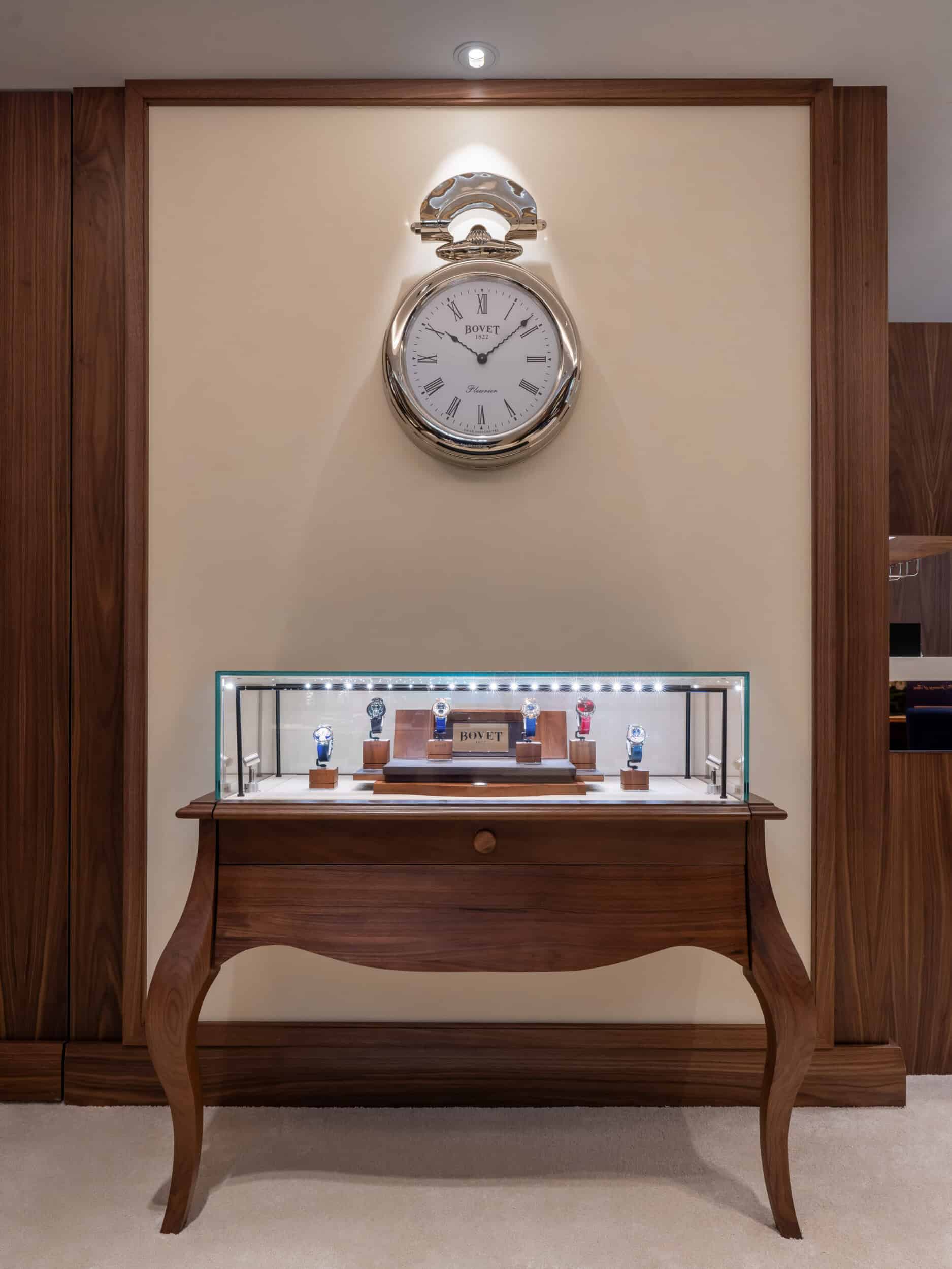 Elegant Bovet timepiece displayed on a wall clock at Cortina Watch Hotel Royal-Nikko Taipei.