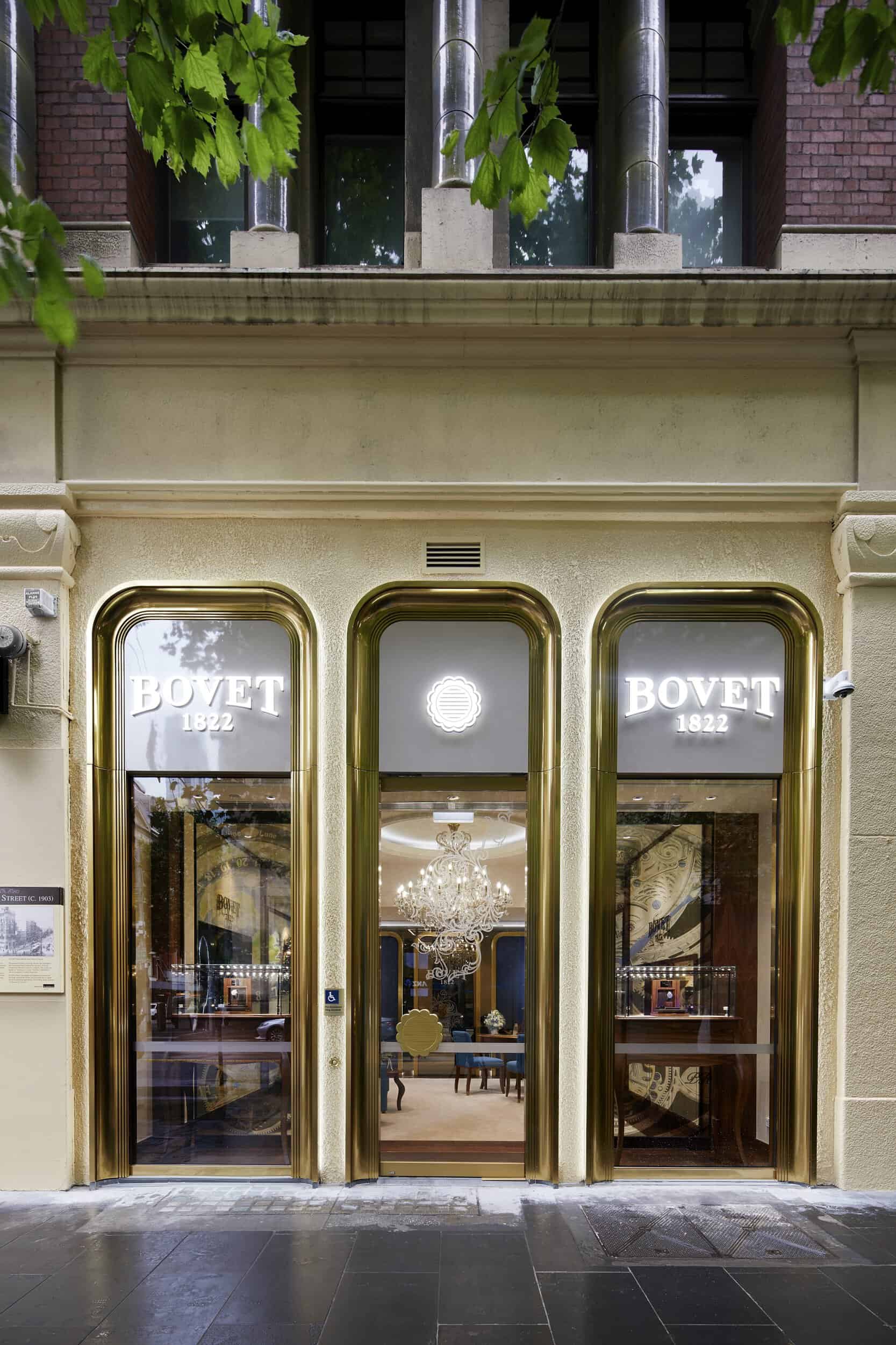 Elegant storefront of Bovet boutique with gold accents, celebrating luxury timepieces and the grand.