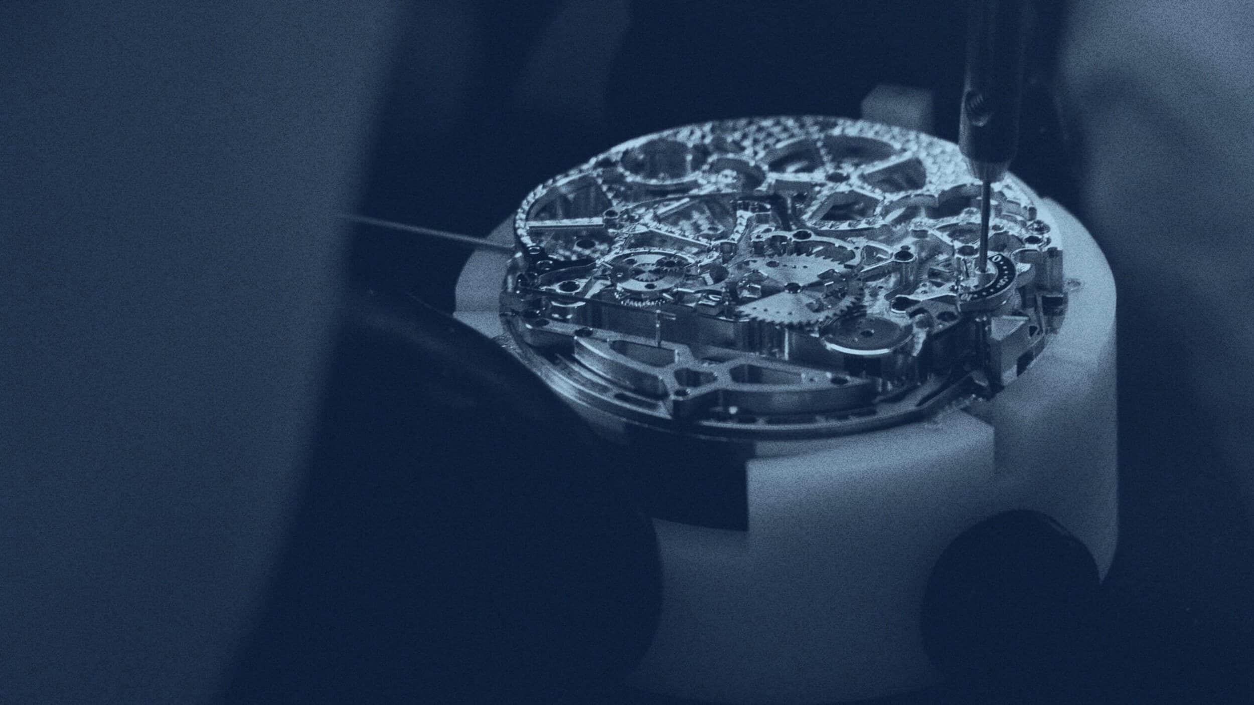 Intricate mechanical movement of a luxury timepiece showcasing craftsmanship and precision.