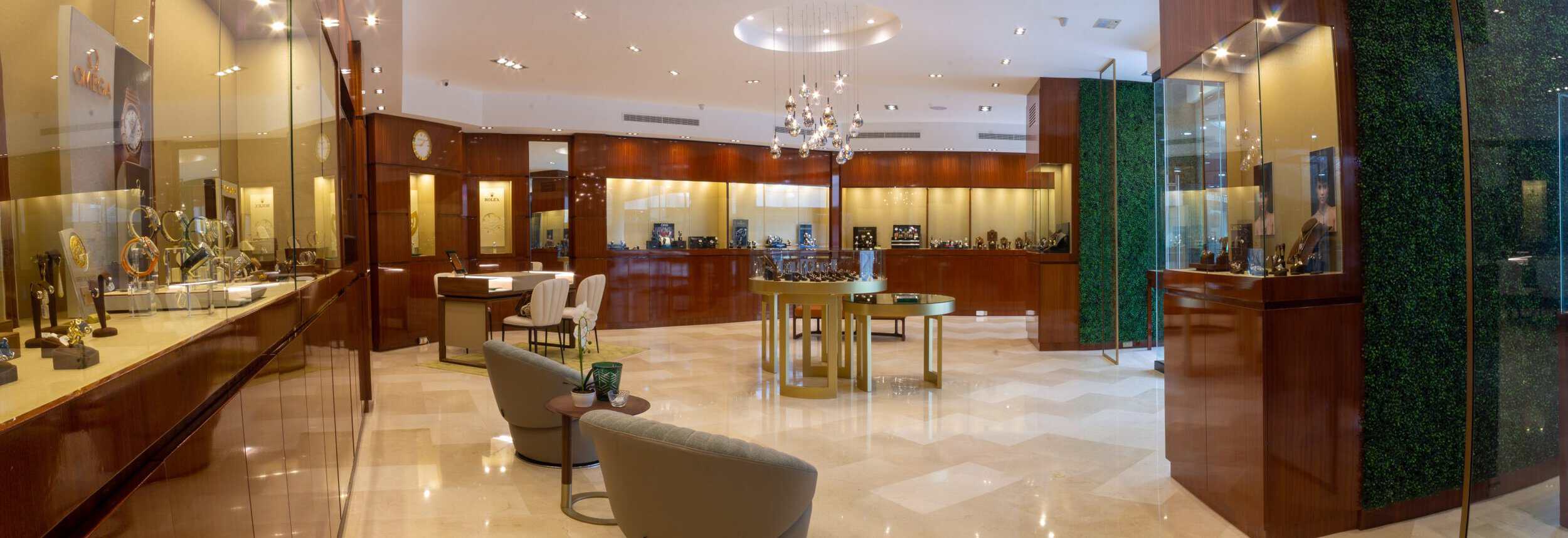 Luxurious jewelry boutique interior showcasing elegant display cases and sophisticated ambiance.