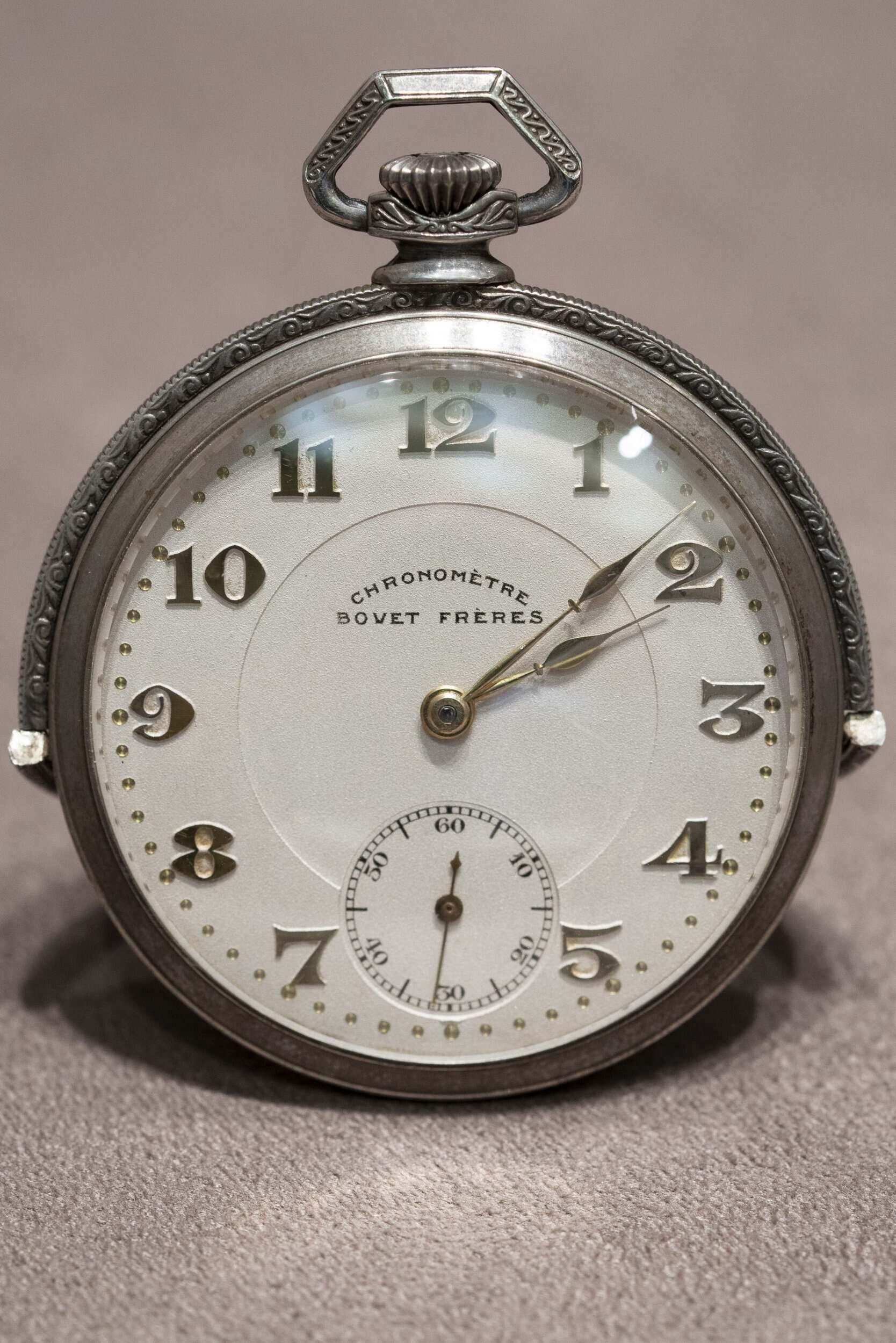 A detailed vintage Bovet pocket timepiece with classic design and intricate craftsmanship.
