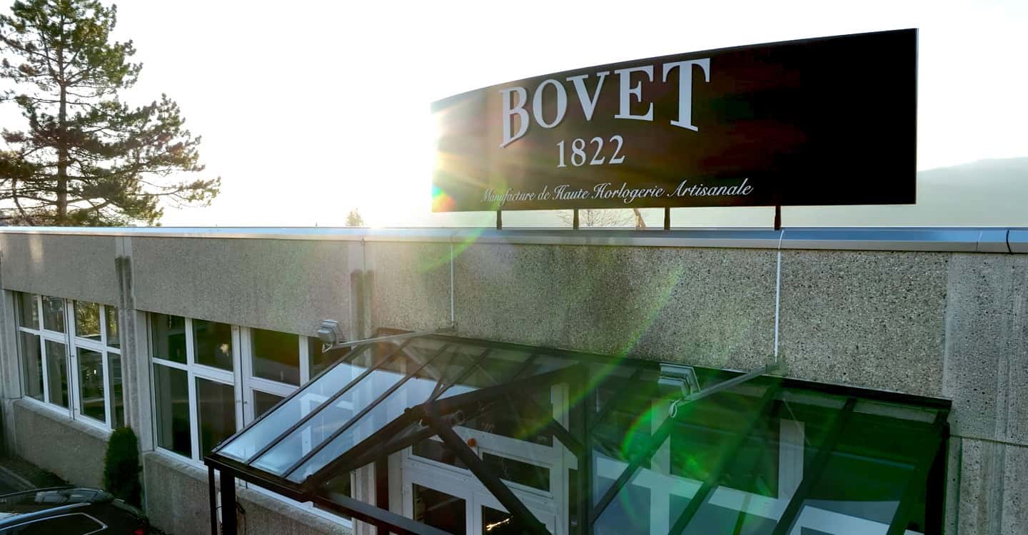 The House of Bovet sign on building rooftop, showcasing the luxury Swiss brand's heritage since 1822.