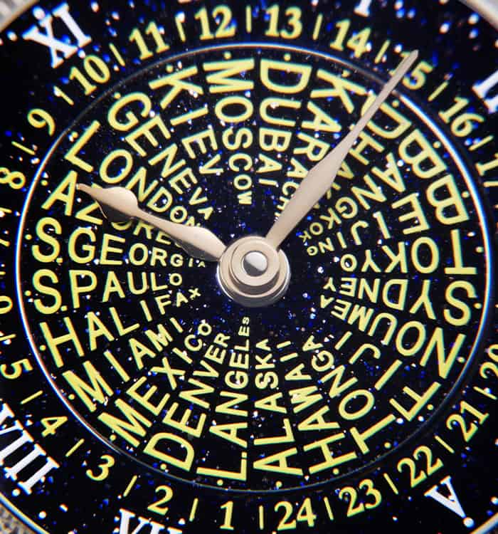 Intricate dial of a Bovet timepiece with city names and detailed markers.