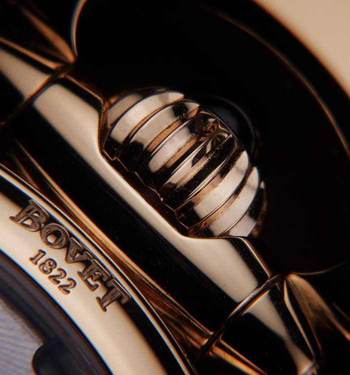 A detailed close-up of a Bovet timepiece showcasing intricate craftsmanship and polished metal compo.