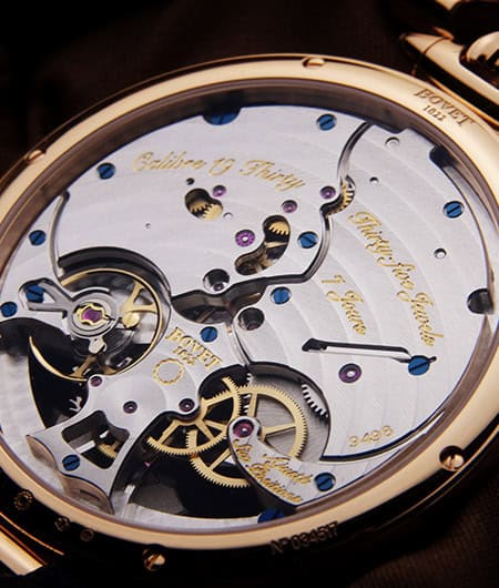 Exquisite Bovet timepiece with intricate mechanical movement and gold accents.